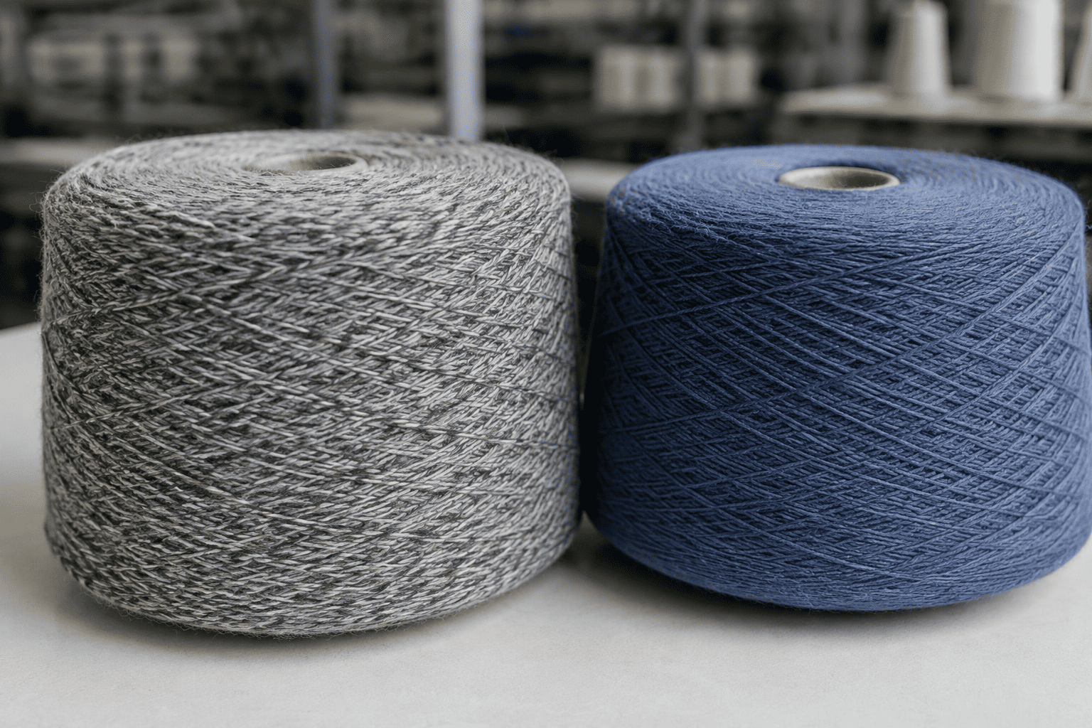 heather grey yarn next to a solid color yarn to show complexity